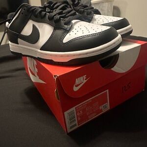 Woman’s nike panda dunks